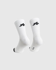 Assos Spring Fall Socks P3 cycling socks in White Series colourway, rear view showing textured breathable fabric, Assos logo below the cuff, black toe reinforcement, and size marking detail.