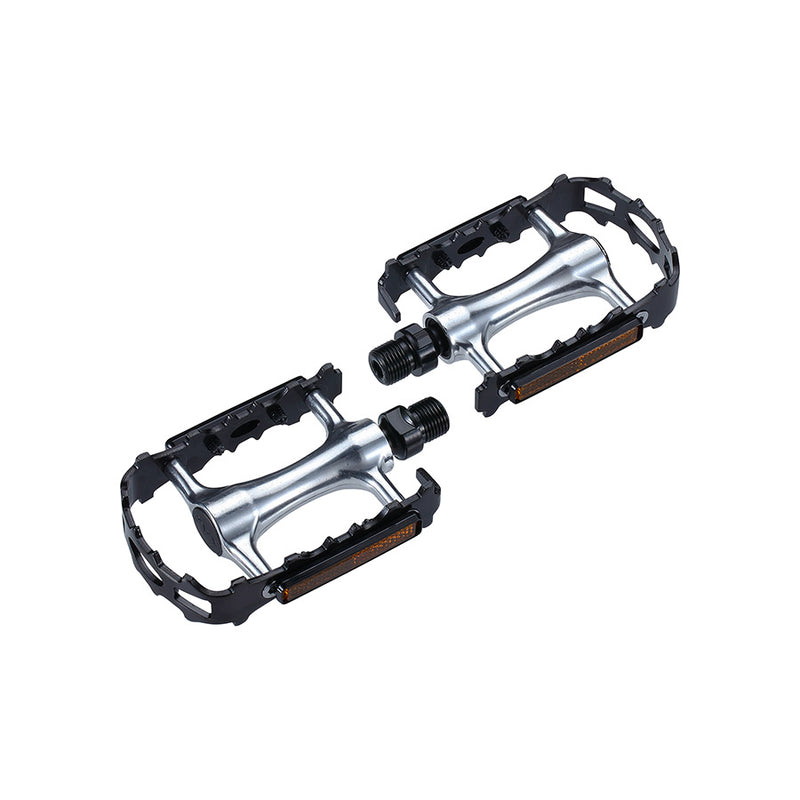 Pair of bicycle pedals with metallic finish on a white background