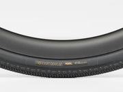 Close-up of a black bicycle tire with 'Girona' branding on a white background