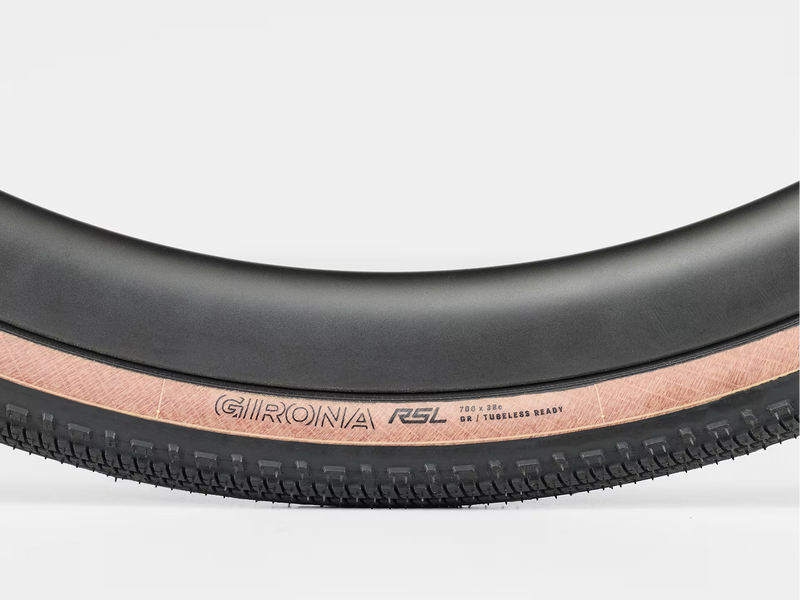 Close-up of a Girona RSL bicycle tire on a white background