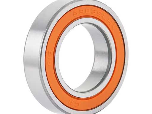 Metallic bearing with orange inner ring on a white background; a bearing