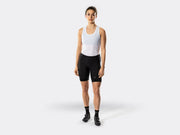 Bontrager Anara women's black cycling shorts full-length view on model, featuring a flattering fitted silhouette, wide waistband, ergonomic panel construction, and Bontrager branding for road and fitness cycling.