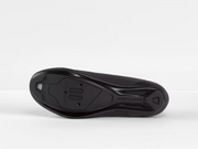 Bottom profile view of black Bontrager Circuit shoe showing the Bronze Series nylon composite sole featuring universal 3-bolt road and recessed 2-bolt SPD cleat mounting compatibility