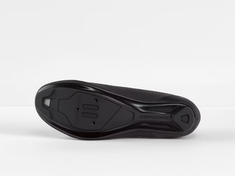 Bottom profile view of black Bontrager Circuit shoe showing the Bronze Series nylon composite sole featuring universal 3-bolt road and recessed 2-bolt SPD cleat mounting compatibility
