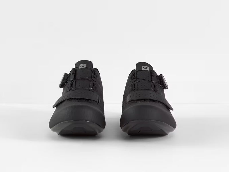 Frontal view of paired black Bontrager Circuit road shoes displaying toe box profiles, forefoot straps, and upper curvature