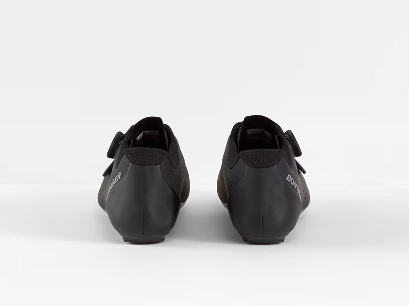 Rear view of paired black Bontrager Circuit road shoes highlighting heel counter structure, ankle collars, and rear pull tabs