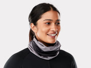 Bontrager Convertible neck gaiter in Black/Charcoal, worn pulled down around the neck