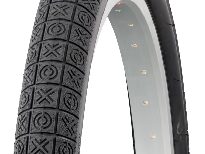Close-up of a bicycle tire with tread pattern on a white background