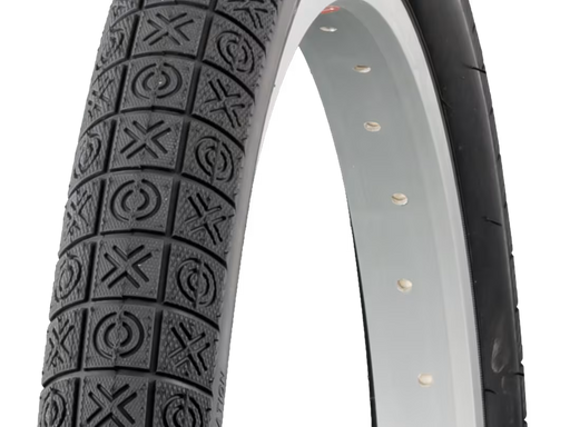 Close-up of a bicycle tire with tread pattern on a white background