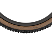 Close-up of a mountain bike tire showing the sidewall with embossed branding 'GUNNISON' and 'RSL', on a clean white background.