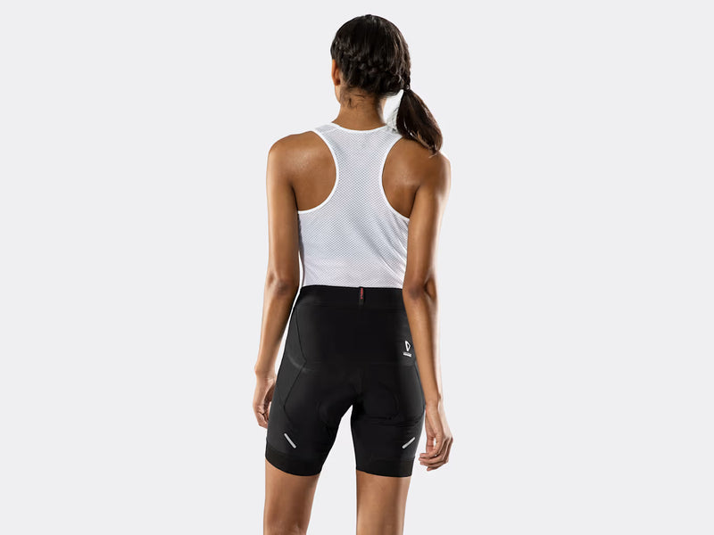 Rear view of the black Bontrager Meraj Women's Cycling Short on a female model, highlighting the high-rise waistband, centre rear panel, reflective side details and rear Bontrager branding.