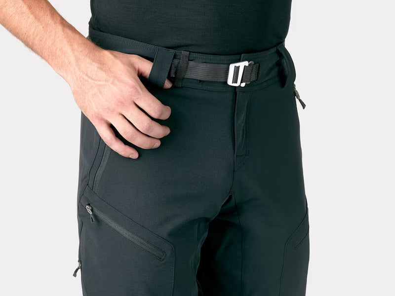 Bontrager OMW softshell pant in black worn, close-up of waist with belt strap and zippered pocket