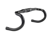 Product image of the Bontrager Pro IsoCore VR‑CF Road Handlebar shown in a 3/4 angle facing right, with its compact‑flare carbon shape visible against a white background.
