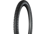 Black bicycle tire with tread pattern on a white background
