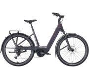 A dark gray step-through electric bicycle with a rear cargo rack, fenders, and a sleek frame, shown against a plain white background.
