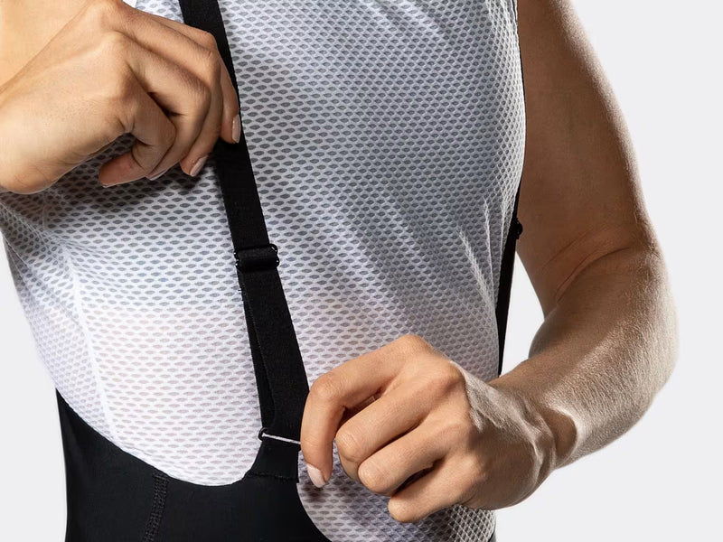 Close-up of Bontrager Circuit women's cycling bib shorts upper section, featuring lightweight elastic bib straps, breathable construction, and a comfortable women-specific fit for long-distance riding.