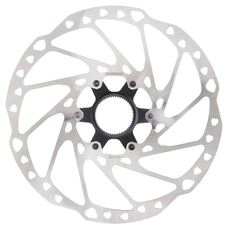 Bicycle disc brake rotor on a white background