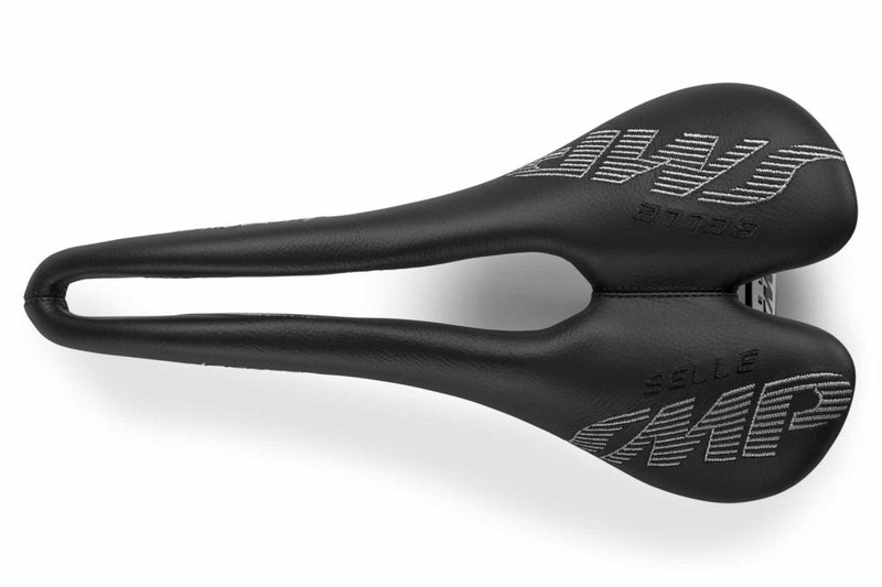 Selle SMP Dynamic Saddle side view with curved profile, white stitched logos, and ergonomic cutout, tip facing left.