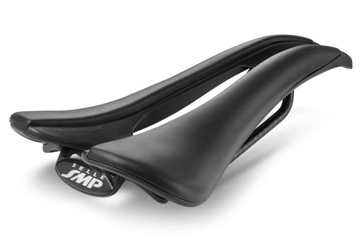 Selle SMP EVO Saddle in black with embossed EVO texture and central ergonomic cutout, shown at a back diagonal angle.