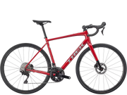 Red bicycle with black components on a white background