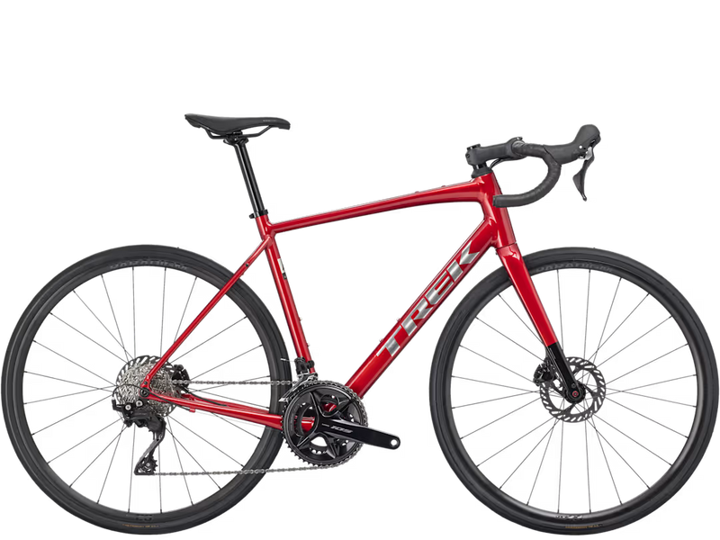 Red bicycle with black components on a white background