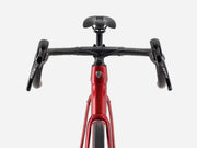 Red bicycle frame with black handlebars on a white background
