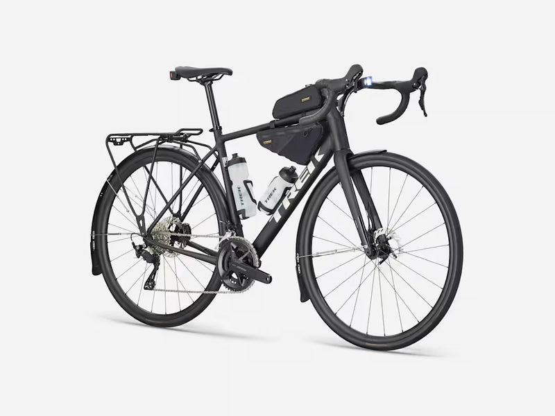 Black bicycle with gear packs on a white background
