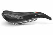 Selle SMP Glider Saddle side view with curved profile, white stitched logos, and ergonomic cutout, tip facing right.