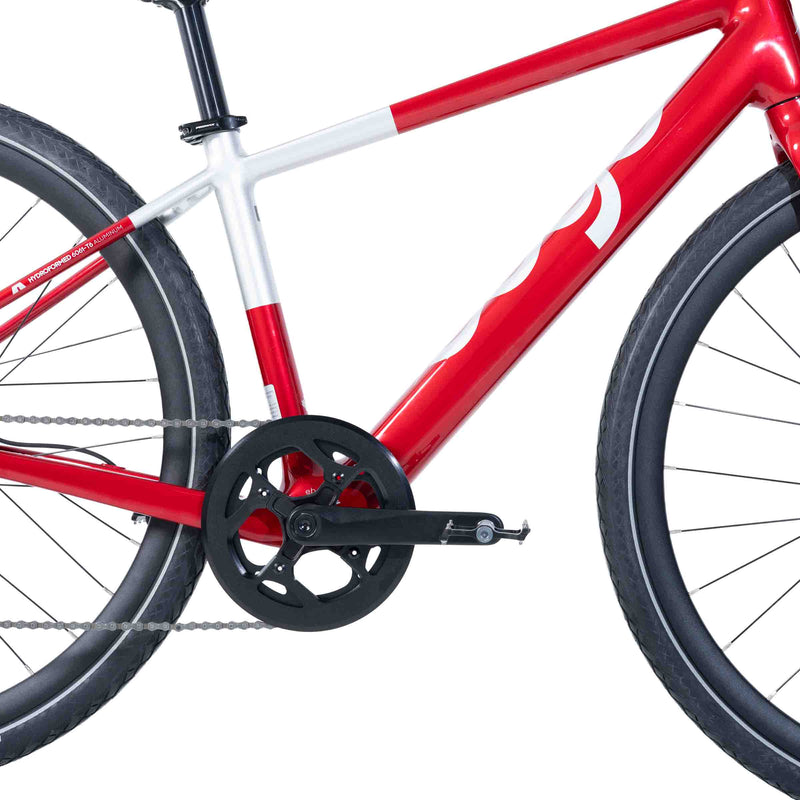 Detailed close-up of the drive-side crank, chain and drivetrain on the red Ebgo Modal Sport TB electric bike.