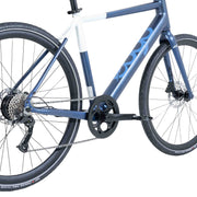 Close-up of the drive-side crank, pedal and drivetrain on the blue Ebgo Modal Sport TB electric bike.