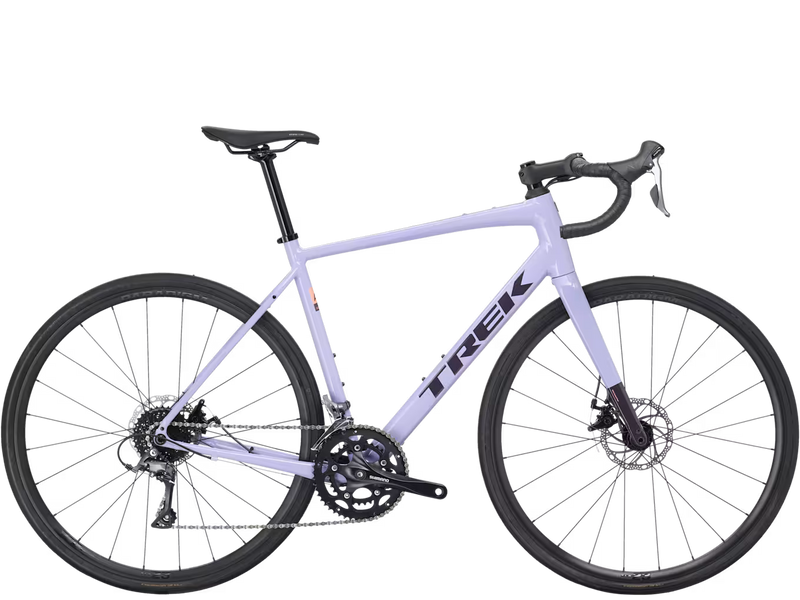 Light purple (lavender) endurance road bicycle with black components on a white background