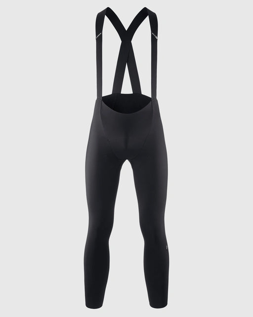 Black cycling bib pants on a light gray background