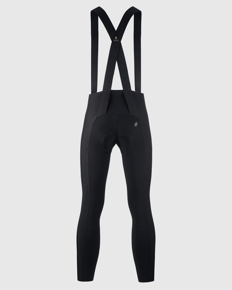 Black cycling bib pants on a light gray background
