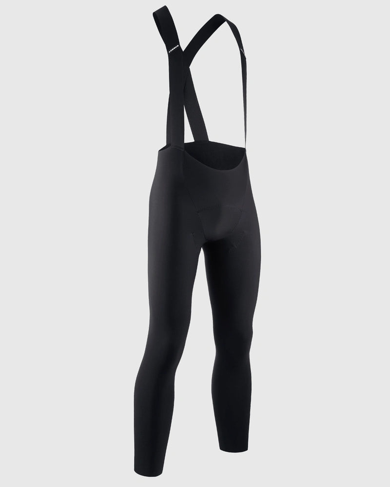 Black cycling bib pants on a light gray background
