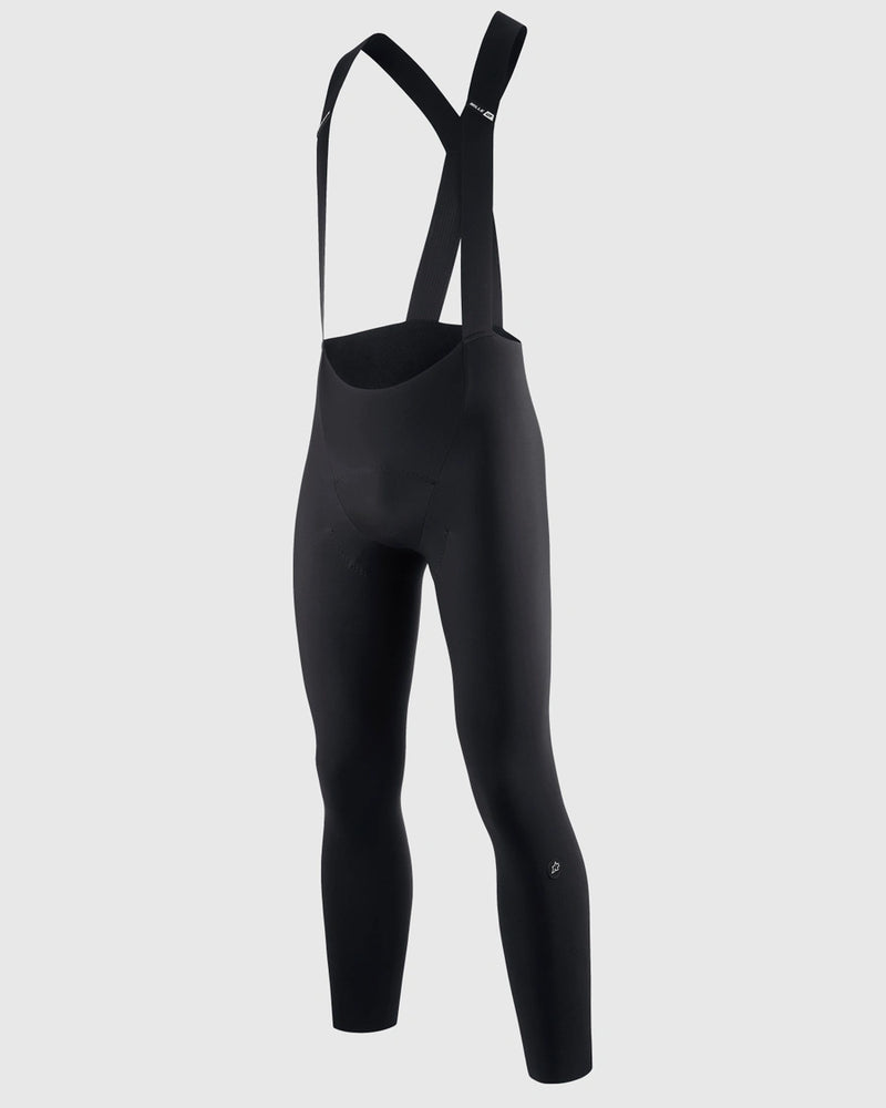 Black cycling bib pants on a light gray background