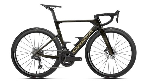 A high-end Orbea performance road bicycle in matte black with gold accents, featuring deep drop handlebars, carbon fiber wheels, and a sleek carbon frame, shown against a solid white background.