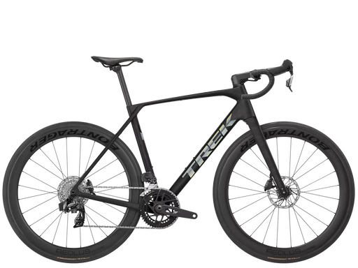 A black Trek road endurance racing bicycle with drop handlebars, deep carbon fiber wheels, and the Trek logo in white on the frame, shown against a solid white background.