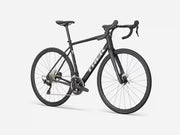 Black bicycle with 'Trek' branding on a white background