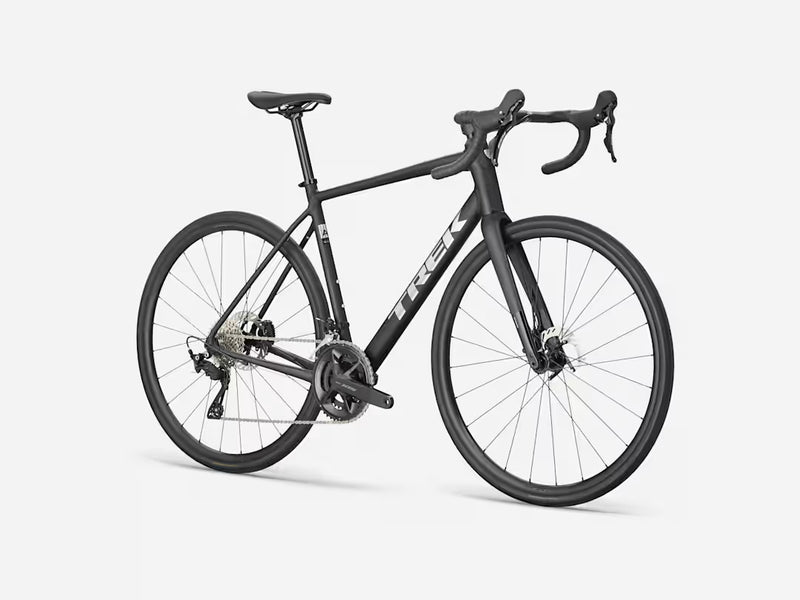 Black bicycle with 'Trek' branding on a white background
