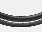 Close-up of a bicycle tire with 'H2 Hard-Case Ultimate' branding on a white background