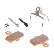 Bicycle brake pad set with tools on a white background