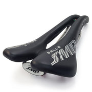 Product image of the Selle SMP Nymber Saddle in black leather with stitched SMP logo and central ergonomic cutout.