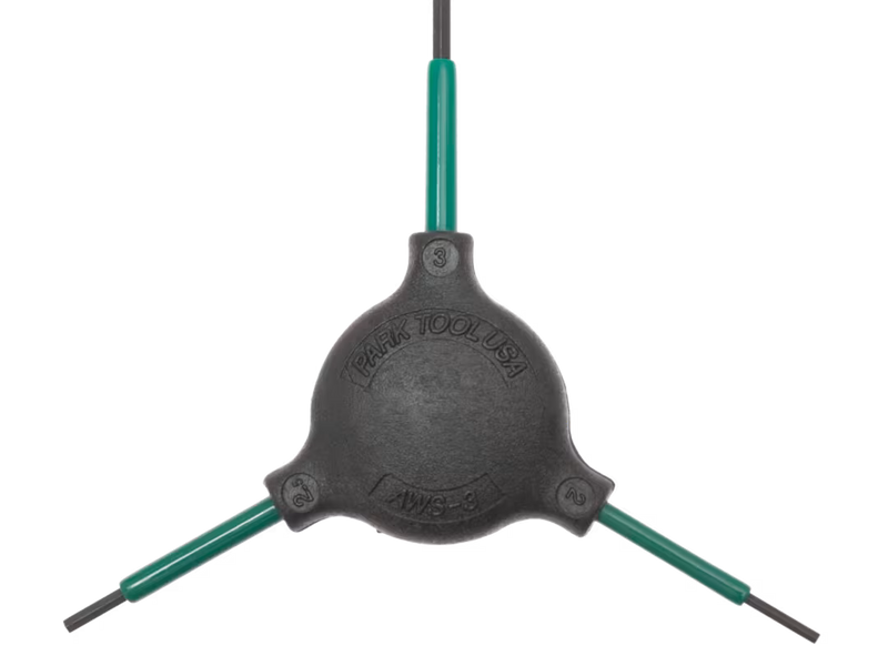 Black three-way tool head with green extensions on a white background