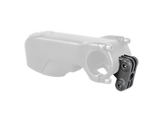A black quick-release bicycle headset spacer or adapter mounted to a silver bicycle stem, shown against a plain white background with a faintly visible white stem overlay.