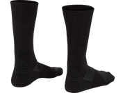 Product image of a pair of black Bontrager Race Merino Wool Crew Cycling Socks shown from the rear, featuring subtle dark grey geometric graphics along the ankle and heel area with visible wraparound pattern details on a white background.