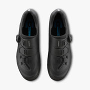 Top-down overhead view of paired black Shimano SH-XC503 shoes showing instep strap layout, ankle collar opening, and branded Shimano ergonomic footbed