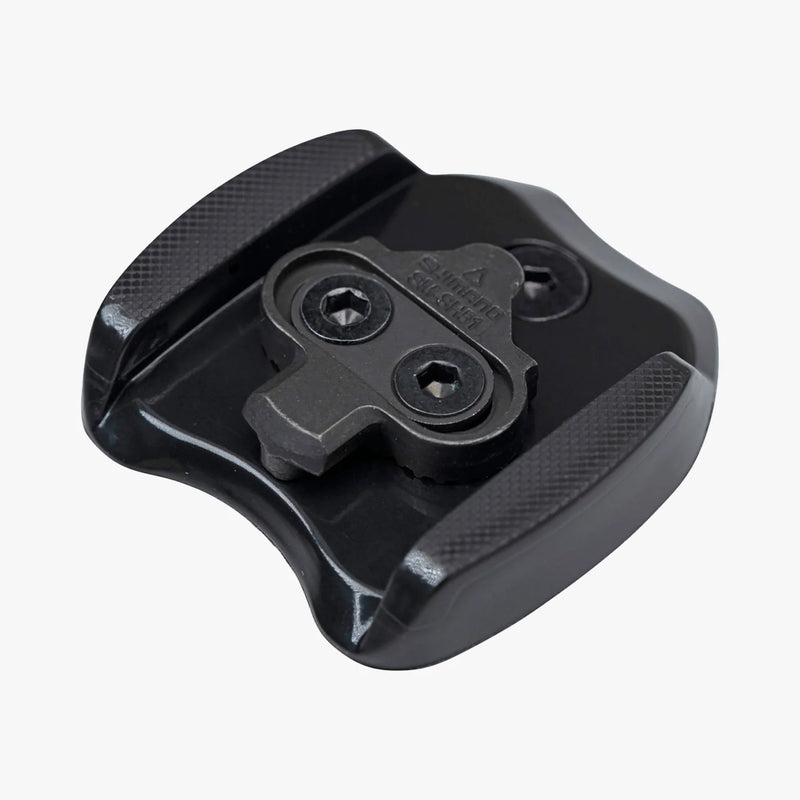 Black metal bracket with threaded holes on a white background