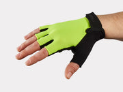 Trek Solstice Gel short-finger cycling glove in visibility yellow, back of hand view with hook-and-loop strap