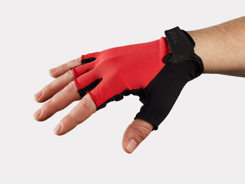 Trek Solstice Gel short-finger cycling glove in viper red, back of hand view with hook-and-loop strap and Trek logo