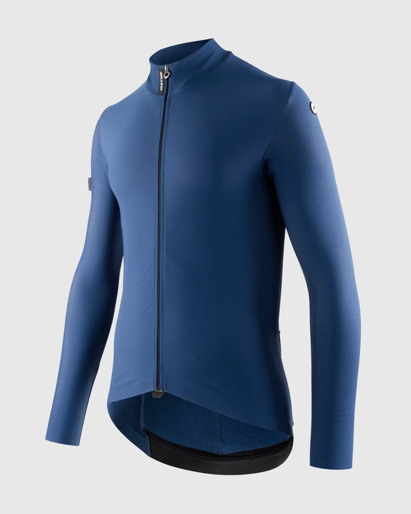 Blue cycling jacket on a light gray background, side view